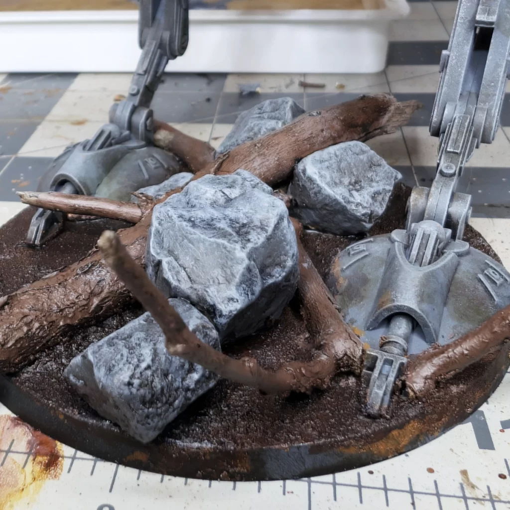 Drybrush Dawnstone on the Rocks