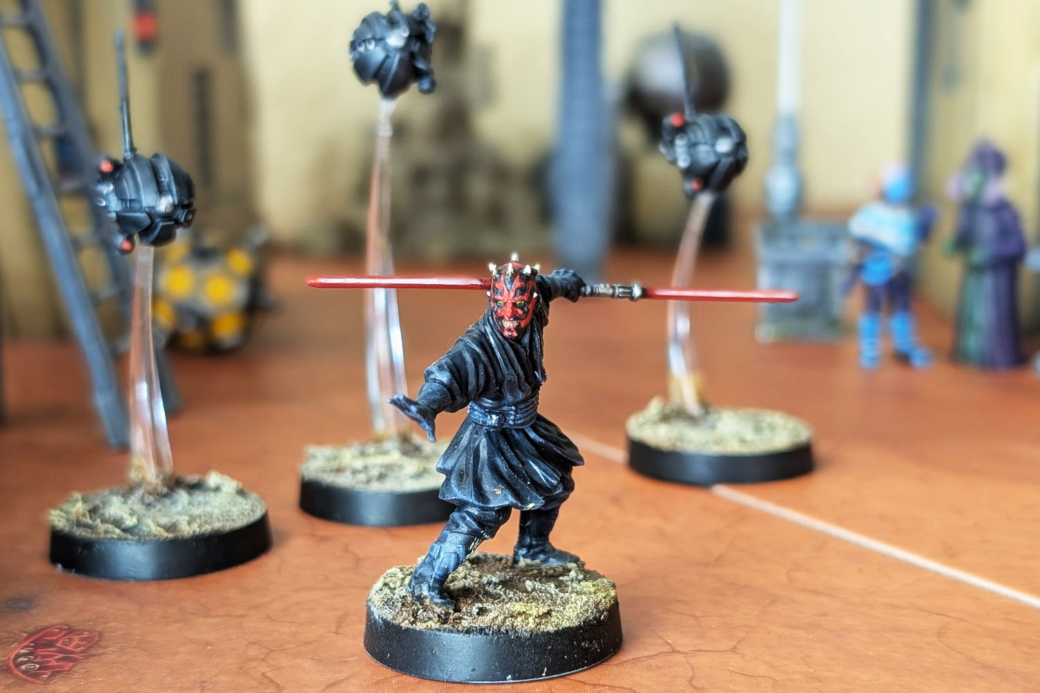 Expertly painted Darth Maul tabletop miniature with smooth matte finishes and crisp edge highlights.